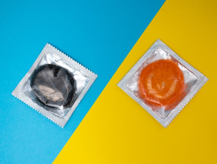 two gray packets on blue and yellow surface